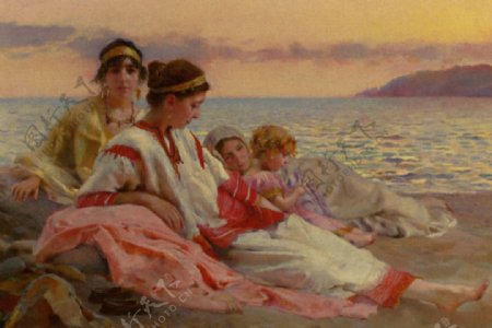 海滩休息的女人和孩子图片