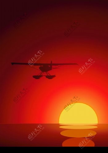 日落下的飞机图片