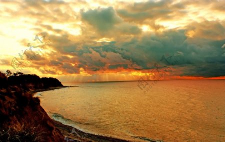夕阳海岸美景图片