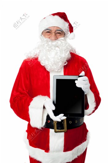 拿着平板电脑的圣诞老人图片