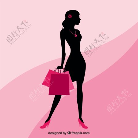 一个女人的轮廓与购物袋