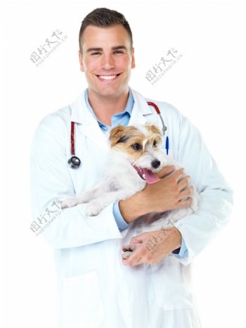 抱着宠物狗的医生图片