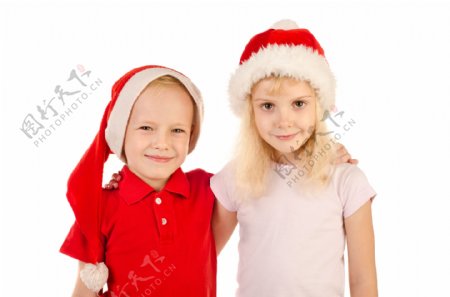 戴着圣诞帽的男孩与女孩图片
